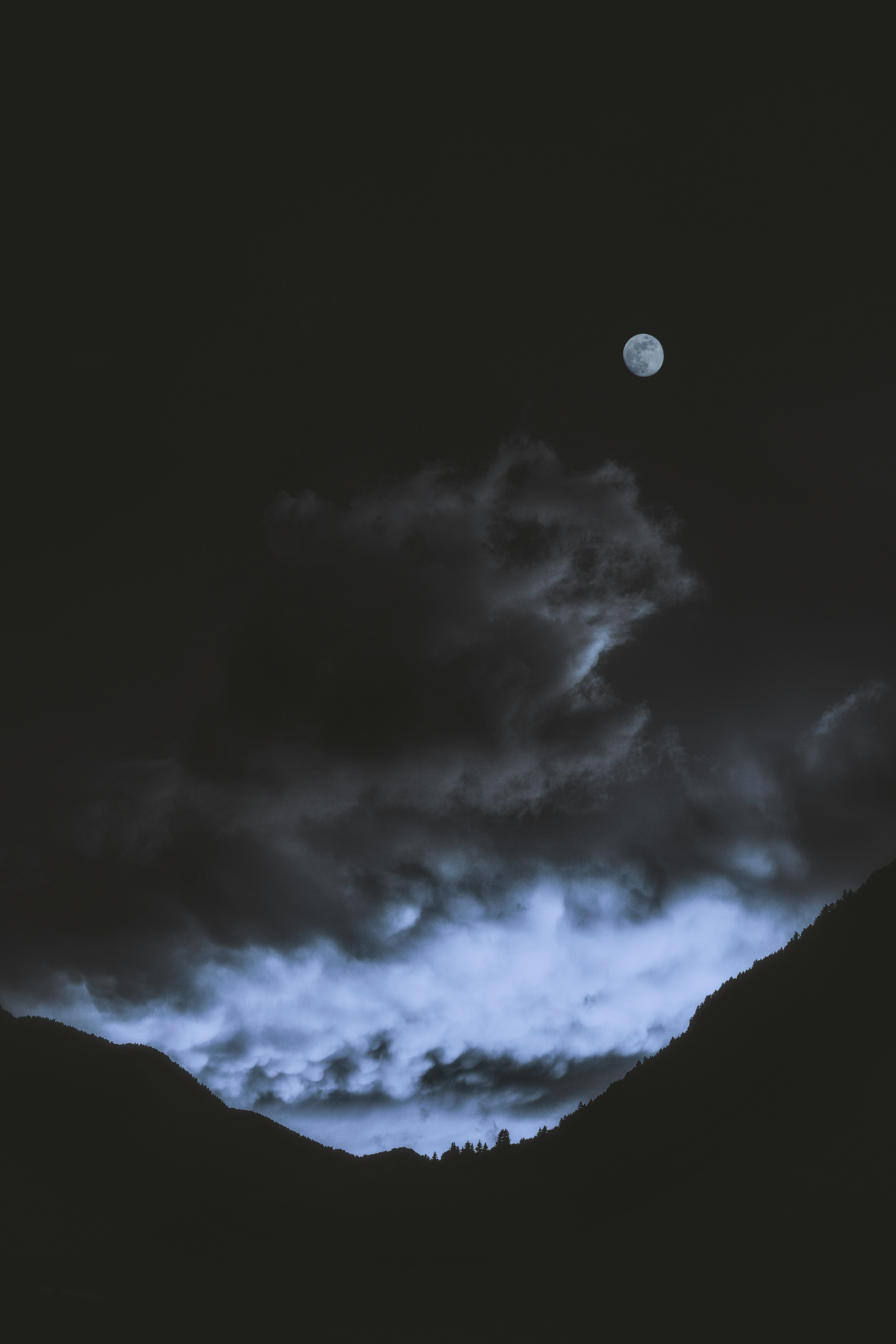 grey mountain at night